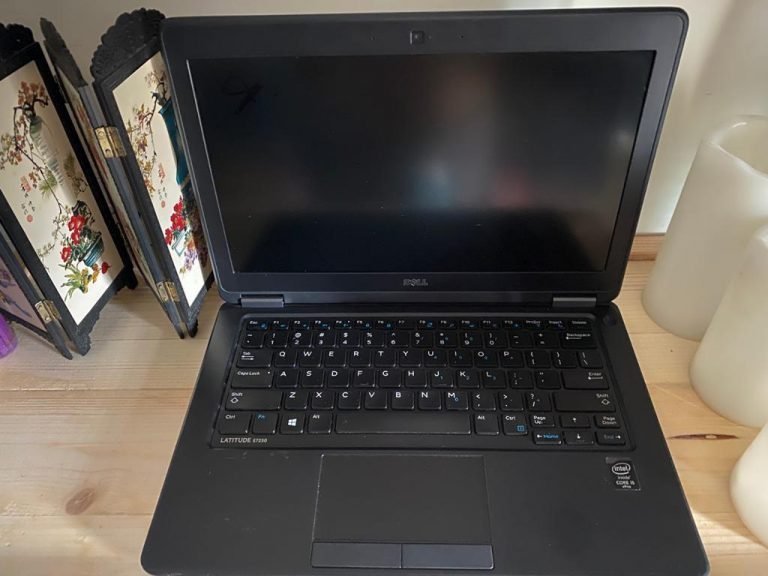 Dell Latitude E7250, used business laptop, graded Grade A, in stock at Aariz Traders Rawalpindi